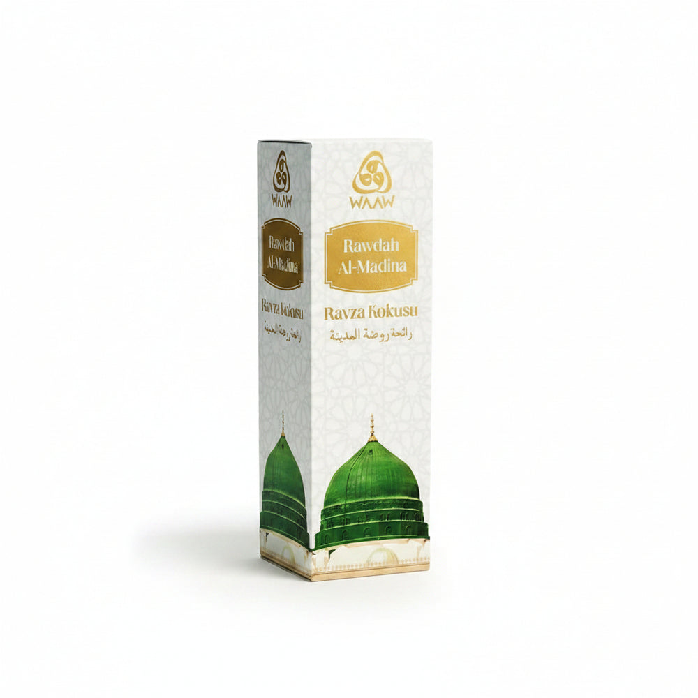 WAAW Rawdah Al-Madina Ravza Kokusu perfume box, featuring a white background with gold Arabic and English lettering, a gold WAAW logo, and an illustration of the green dome of Mecca.