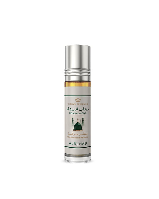 A roll-on perfume bottle with a silver cap and a white label featuring green and gold details, labeled 'Al Rehab' by Crown Perfumes, on a plain white background.Rehab Almadina Perfume Oil 6ml – Al Rehab