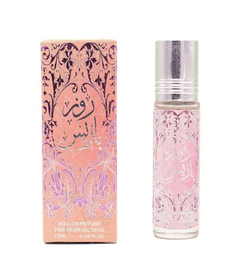A roll-on perfume bottle with a silver cap stands next to its matching pink and gold ornate box on a plain white background.
Rose Paris 10ml Perfume Oil by Ard Al Zaafaran
