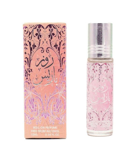 A roll-on perfume bottle with a silver cap stands next to its matching pink and gold ornate box on a plain white background.
Rose Paris 10ml Perfume Oil by Ard Al Zaafaran
