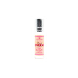 Small bottle with pink label on a white background