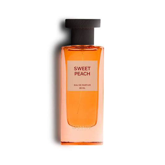 Orange perfume bottle labeled 'Sweet Peach' on a white background Sweet Peach EDP 85ml – Brandy Designs