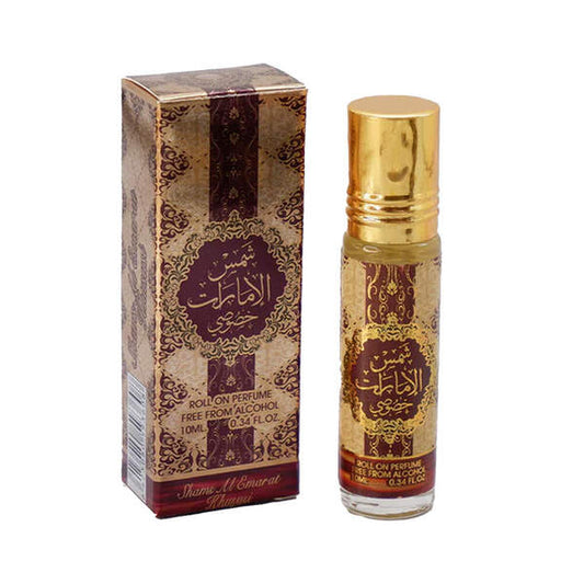 Roll-on perfume bottle with gold cap and decorative packaging on a white backgroundShams Al Emarat Khususi Concentrated Perfume Oil 10ml – Ard Al Zaafaran