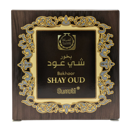 Surrati Shay Oud bakhoor packaging with decorative frame and brand logo.Bukhoor Shay Oud 40g – Surrati