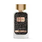 A 50ml bottle of Signature Rose Gold Eau de Parfum, featuring a clear glass body, a black label with gold confetti patterns, and a shiny gold cap, set against a plain white background.Signature Rose Gold – Spicy Amber EDP 100ml – Dkhoon Emirates