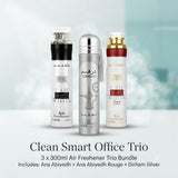 Three air freshener bottles in a bundle: Ana Abiyedh White, Ana Abiyedh Rouge, and Dirham Silver, displayed on a light blue and white background with text reading 'Clean Smart Office Trio'.