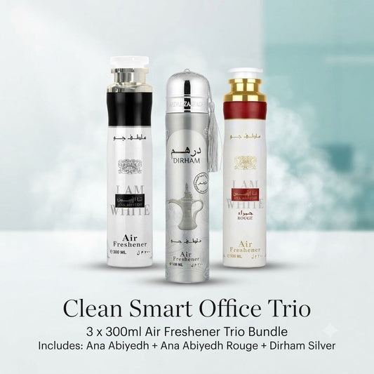 Three air freshener bottles in a bundle: Ana Abiyedh White, Ana Abiyedh Rouge, and Dirham Silver, displayed on a light blue and white background with text reading 'Clean Smart Office Trio'.