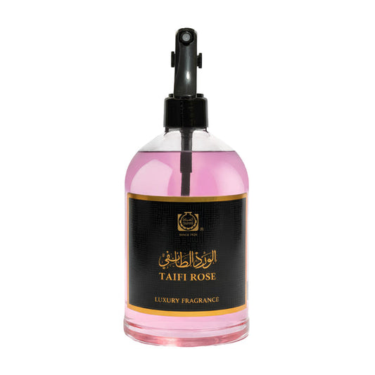 Pink spray bottle with black nozzle labeled 'Taifi Rose' on a white background