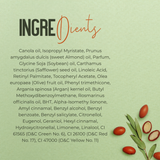 A text-heavy ingredient list on a pale green background, with the heading 'INGREDIENTS' in black and orange script. Small red berries and green leaves appear in the lower right corner.
