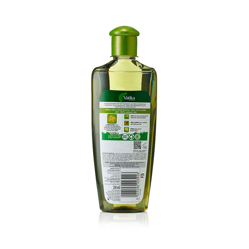 Bottle of olive oil with a green cap on a white background