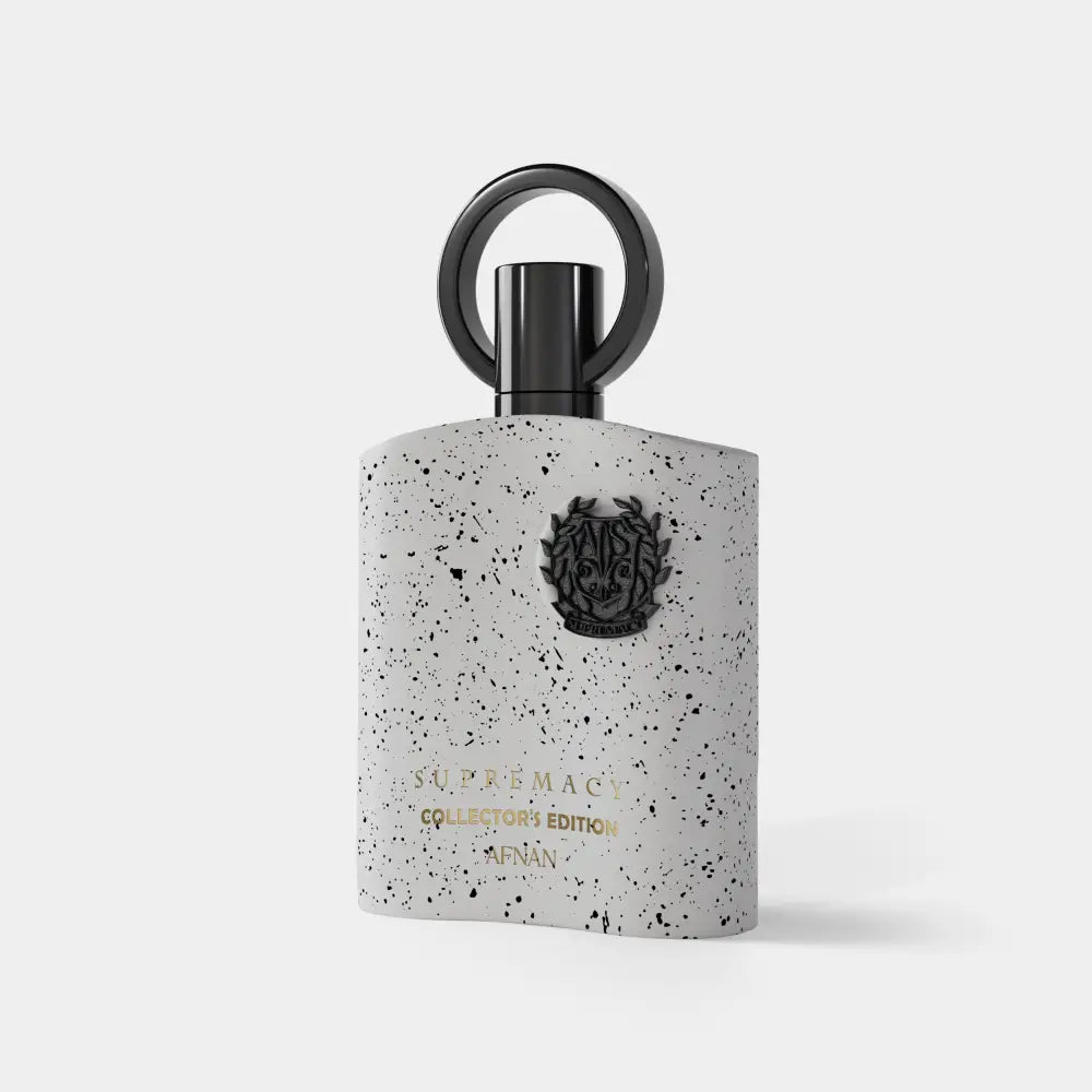 White speckled afnan supremacy collectors edition perfume bottle with black ring cap and embossed crest by afnan