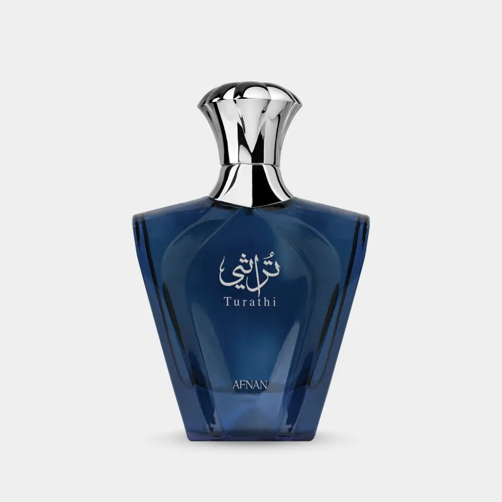 Deep blue glass turathi blue perfume bottle with faceted design and polished silver cap for men 90ml eau de parfum
