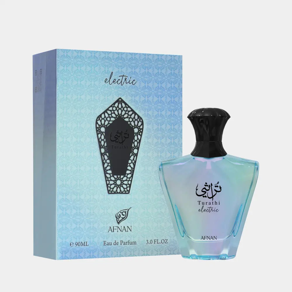 A translucent light blue glass perfume bottle with black cap featuring intricate arabic script for turathi electric signature scent by afnan