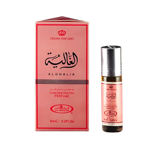 Pink rectangular box with red trim and silver cap containing al rehab concentrated perfume oil al ghalia cpo 6ml