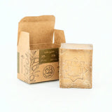 Bar of soap with a brown packaging box on a white background