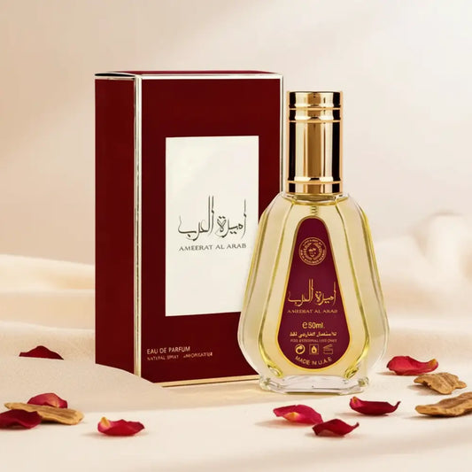 Perfume bottle and packaging with gold and red design on a white background