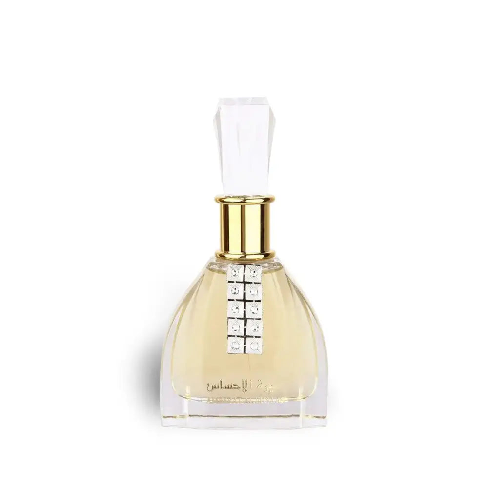 Perfume bottle with gold cap and clear label on a white background