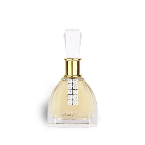 Perfume bottle with gold cap and clear label on a white background