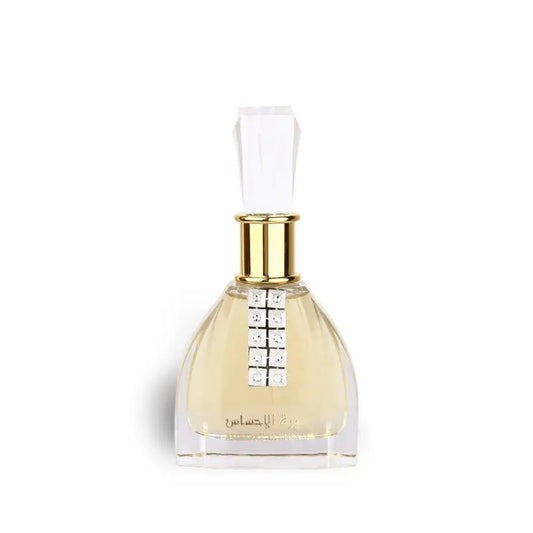 Perfume bottle with gold cap and clear label on a white background
