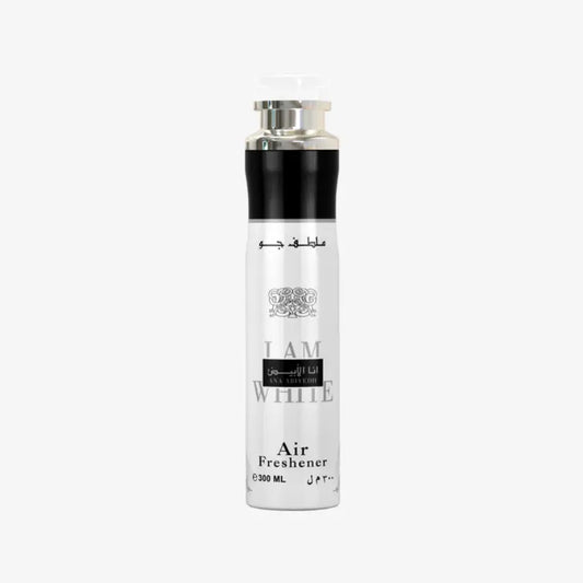 Silver and black cylindrical ana abiyedh air freshener spray with metallic cap labeled i am white by anna sui warm amber scent
