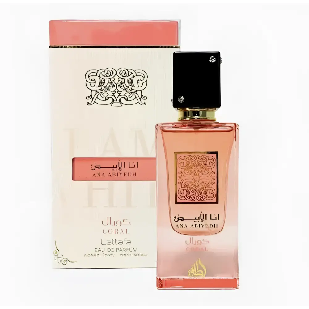 A rectangular glass bottle of coral-colored ana abiyedh coral eau de parfum with black cap and gold accents by lattafa