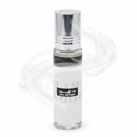Clear glass perfume bottle with a black label on a white background