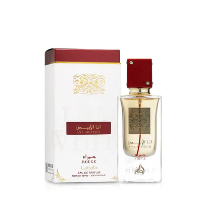 A clear glass bottle of ana abiyedh rouge eau de parfum 60ml with red cap gold accents from the ana abiyedh collection