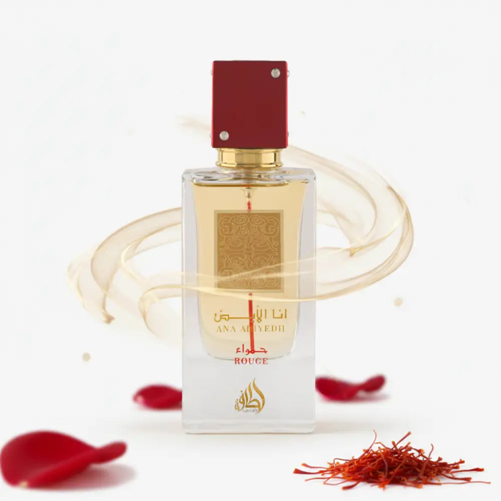 A rectangular glass perfume bottle with red cap and gold accents from ana abiyedh rouge 3x60ml collection