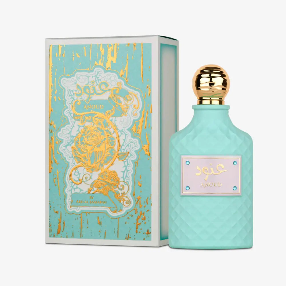 A turquoise diamond-patterned glass perfume bottle with gold cap and arabic label for ard al zaafaran anoud edp 100ml