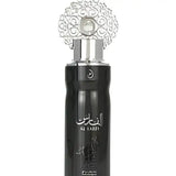 Black cylindrical arabiyat al faris perfume bottle with silver ornate floral cap and arabic script faris edp 100ml deo 200ml