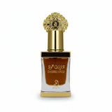Desert Oud perfume bottle with gold cap and Arabic text on a white background