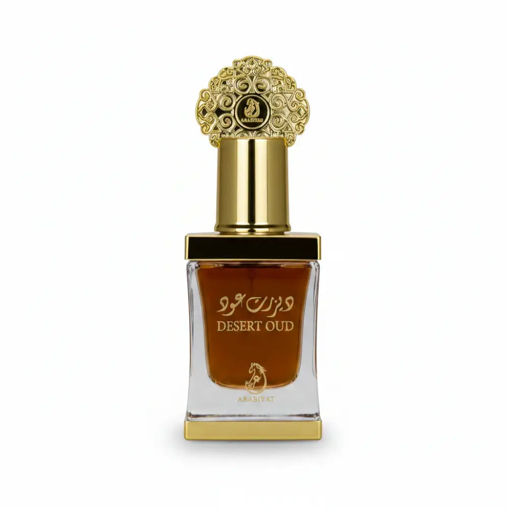 Desert Oud perfume bottle with gold cap and Arabic text on a white background