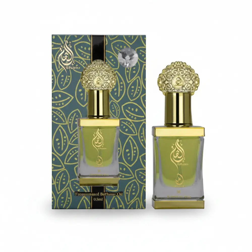 Perfume bottle with gold cap and green packaging on a white background