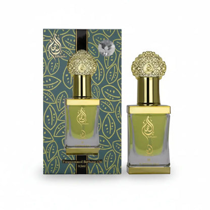Perfume bottle with gold cap and green packaging on a white background