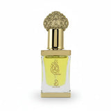 Perfume bottle with gold cap and white label on a white background