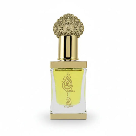 Perfume bottle with gold cap and white label on a white background