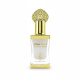 Perfume bottle with gold cap and clear body on a white background