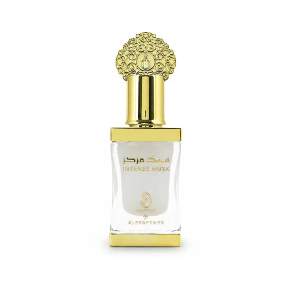 Perfume bottle with gold cap and clear body on a white background