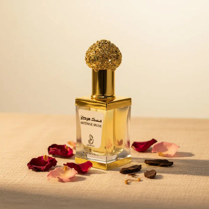 Perfume bottle labeled 'Intense Musk' with a gold cap on a white background
