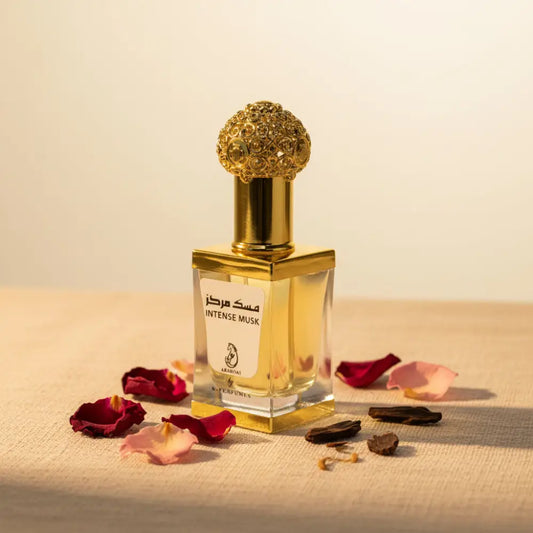 Perfume bottle labeled 'Intense Musk' with a gold cap on a white background