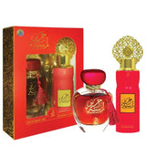 Red glass perfume bottle with gold accents and tassel from arabiyat lamsat harir edp 100ml gift set