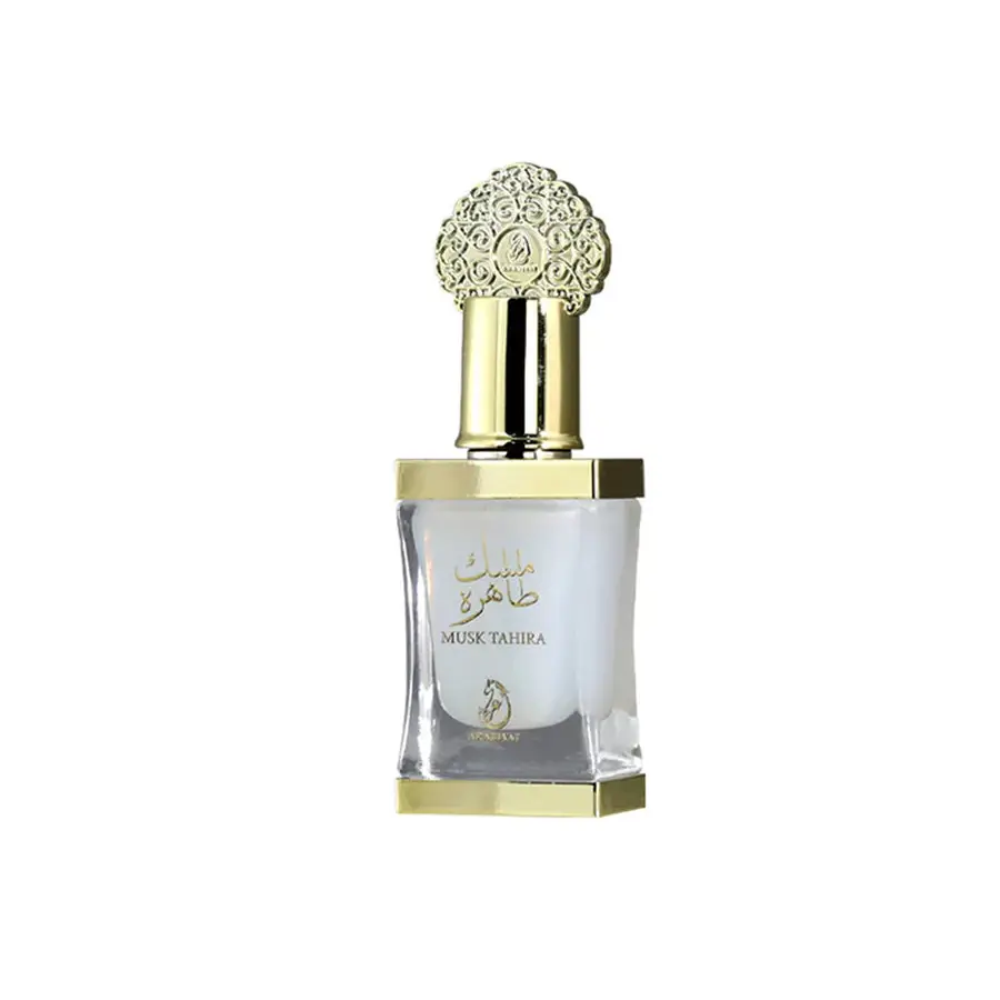 Perfume bottle with gold cap and clear body on a white background