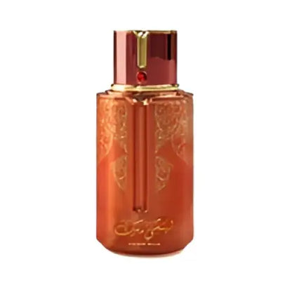 Luxurious amber arabiyat prestige lychee musk perfume bottle with gold leaf detailing and maison margiela embossing