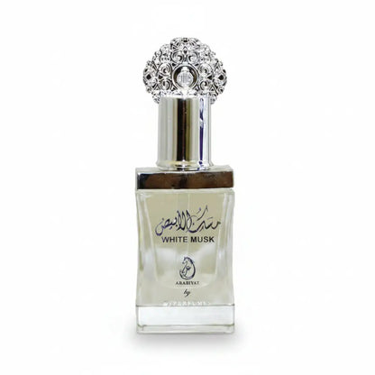 Perfume bottle with decorative cap labeled 'White Musk' by Arabiyat.