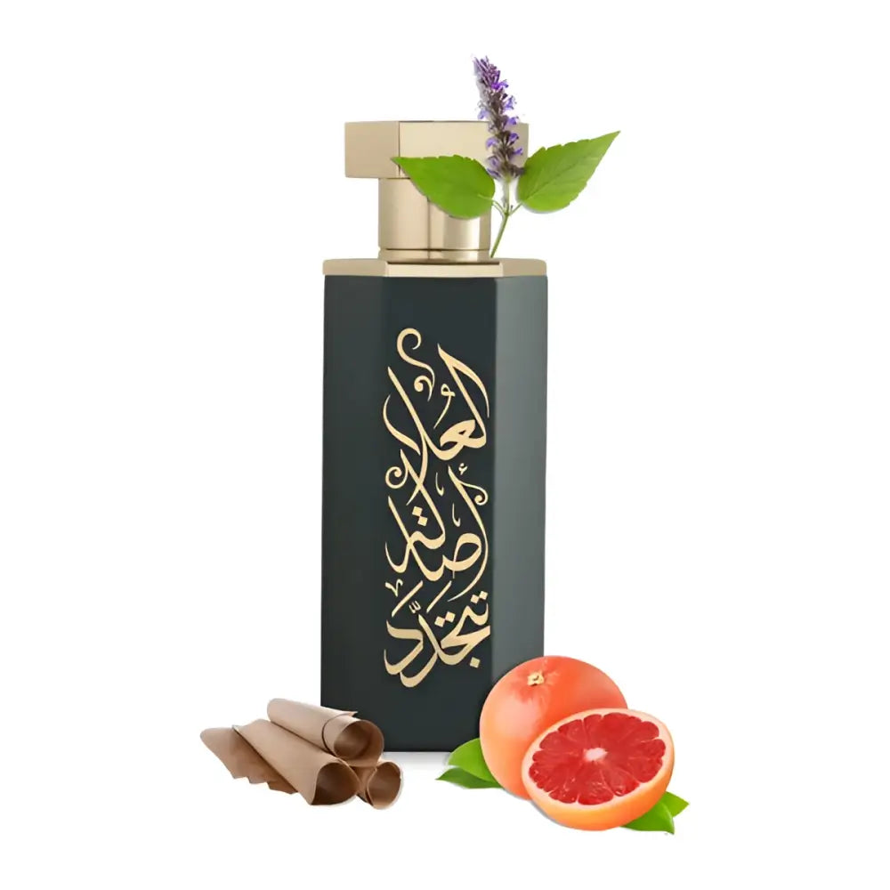 Perfume bottle with floral elements and citrus fruit on a white background