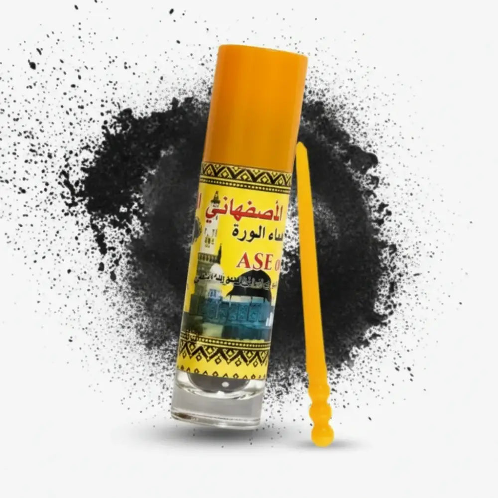 Spray can with black and yellow design on a dark background
