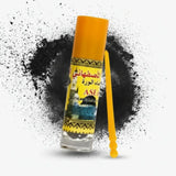 Spray can with black and yellow design on a dark background