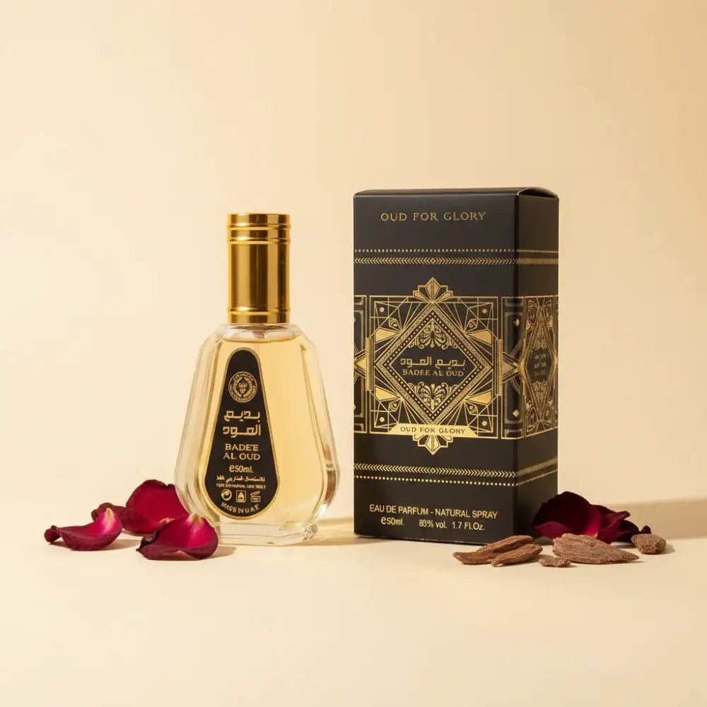 Badee Al Oud perfume bottle and packaging on a white background