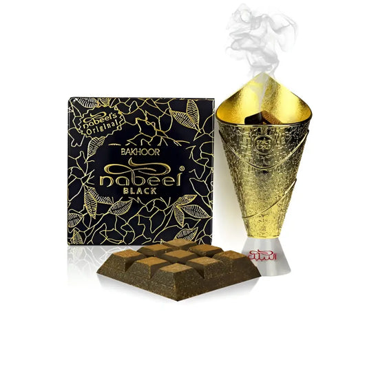 Golden conical incense burner with embossed patterns emitting smoke for nabeel bakhoor arabian oud 40g premium