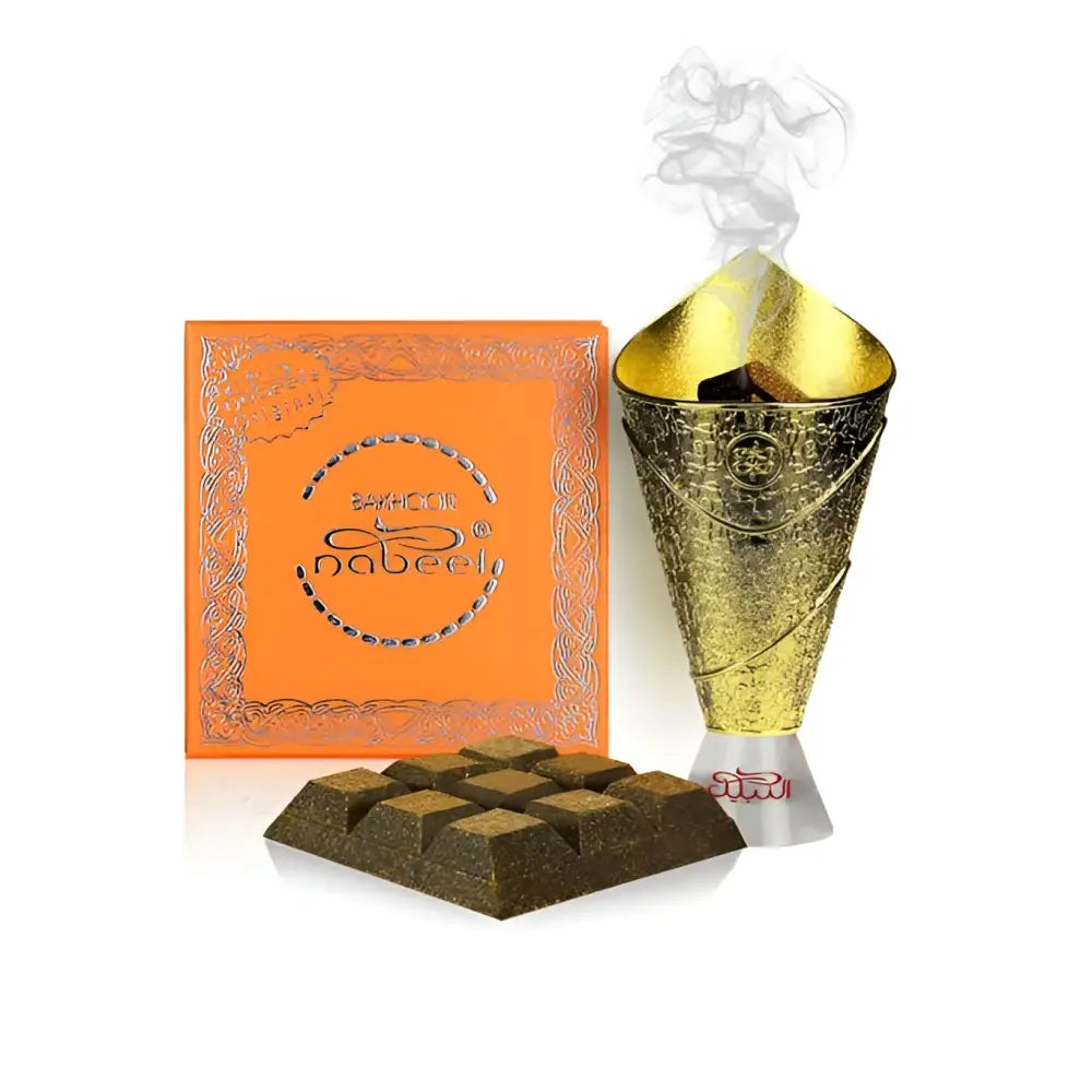 Golden conical incense burner with embossed patterns and white base emitting smoke for bakhoor nabeel arabian oud
